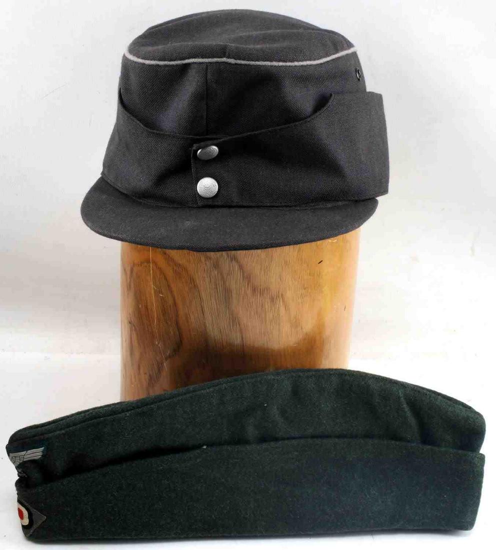 WWII GERMAN THIRD REICH OVERSEAS & FIELD CAP LOT: This lot includes 1 German overseas cap and 1 M-43 field cap. Overseas cap has embroidered Reichsadler and cockade at front and is of dark green wool construction. Field cap has leather sweatband and 