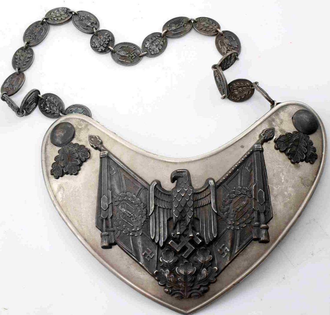 WWII GERMAN 3RD REICH HEER STANDARD BEARER GORGET: German Heer standard bearer gorget. Marked H. Aurich Dresden on uniform clip. Chain has correct round center link and links have excellent detail retention. Very good condition with no mothing to felt
