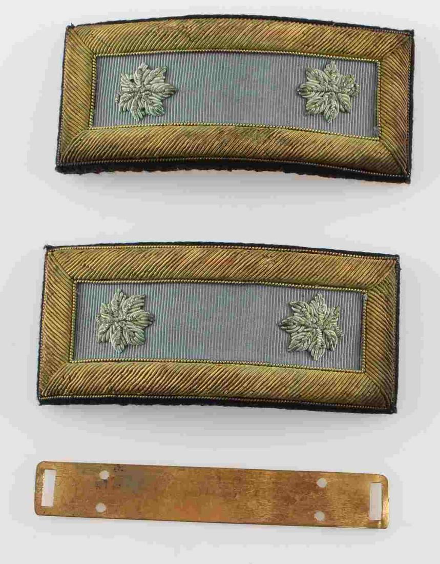 US ARMY ISSUE DRESS SHOULDER BOARDS FOR LT COLONEL: US Army issue shoulder boards for a Lt. Colonel. Bullion chord embroidery. Powder blue board used with Dress Blue uniform for formal occasions.