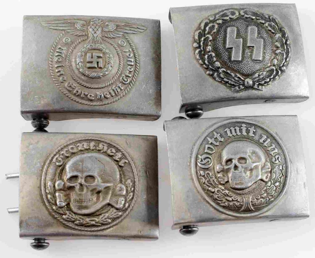 WWII GERMAN THIRD REICH WAFFEN SS BELT BUCKLE: This lot includes a variety of 4 German SS belt buckles. Each is reverse "RZM" marked and is in very good condition overall. Some minor corrosion and signs of use present. Unauthenticated; sold as is.