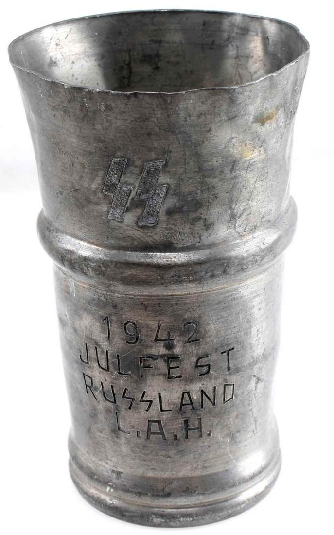 WWII GERMAN THIRD REICH 1942 JULFEST SS CUP: Aluminum cup with hand engraved "SS 1942 Julfest Russland L.A.H." on one side. Measures 4 inches in height. In very good condition. Unauthenticated/Sold 'as is'. This lot has a reserve.