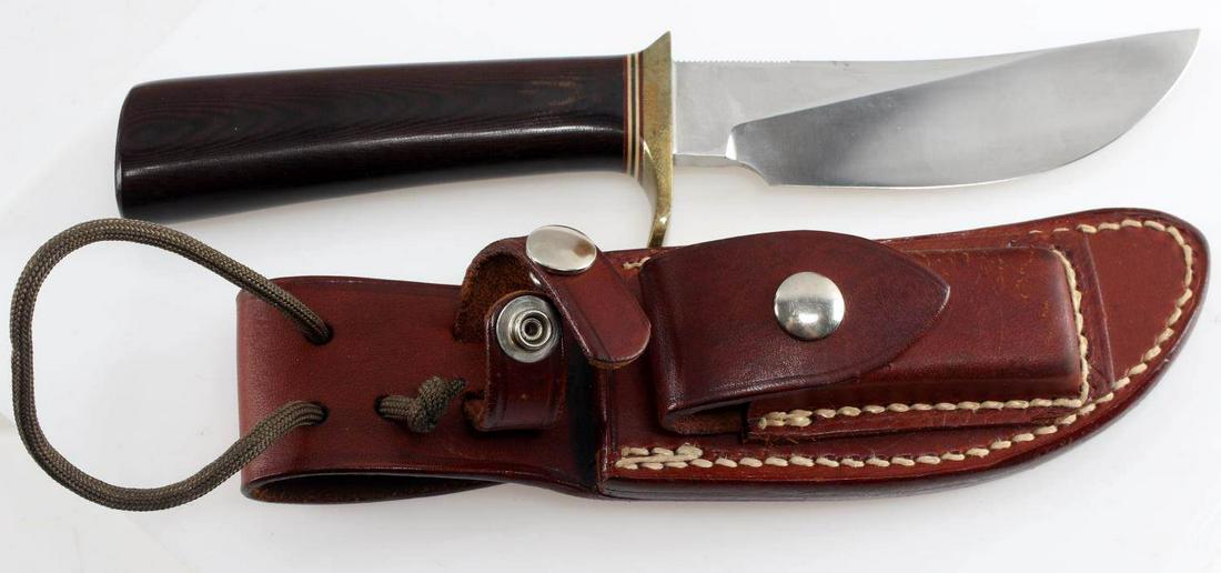 CUSTOM RANDALL MADE KNIFE ORLANDO FL W SHEATH: Blade measures 4 5/8 inches long with maker mark engraved to one side, grooved top part of blade near guard, brass guard, and one-piece micarta grip. Comes with Randall sheath and sharpening stone. Ve