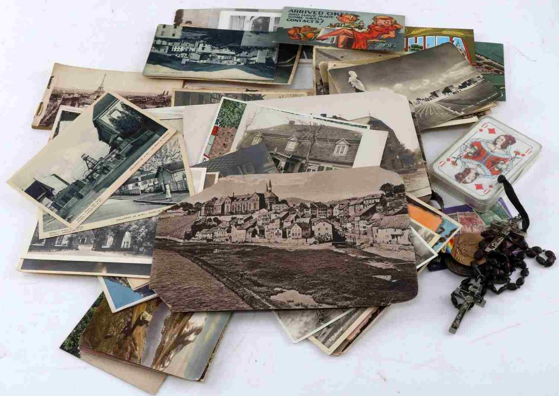 SKULL RING AND CRUCIFIX POSTCARDS MEDALS ROSARY: Includes 75 early half of 20th century postcards European and U.S., a Skull and crossbones Crucifix and rosary, WWI 2 bar Meuse Argonne and defensive sector medal, winged skull silver size 12 bikers r