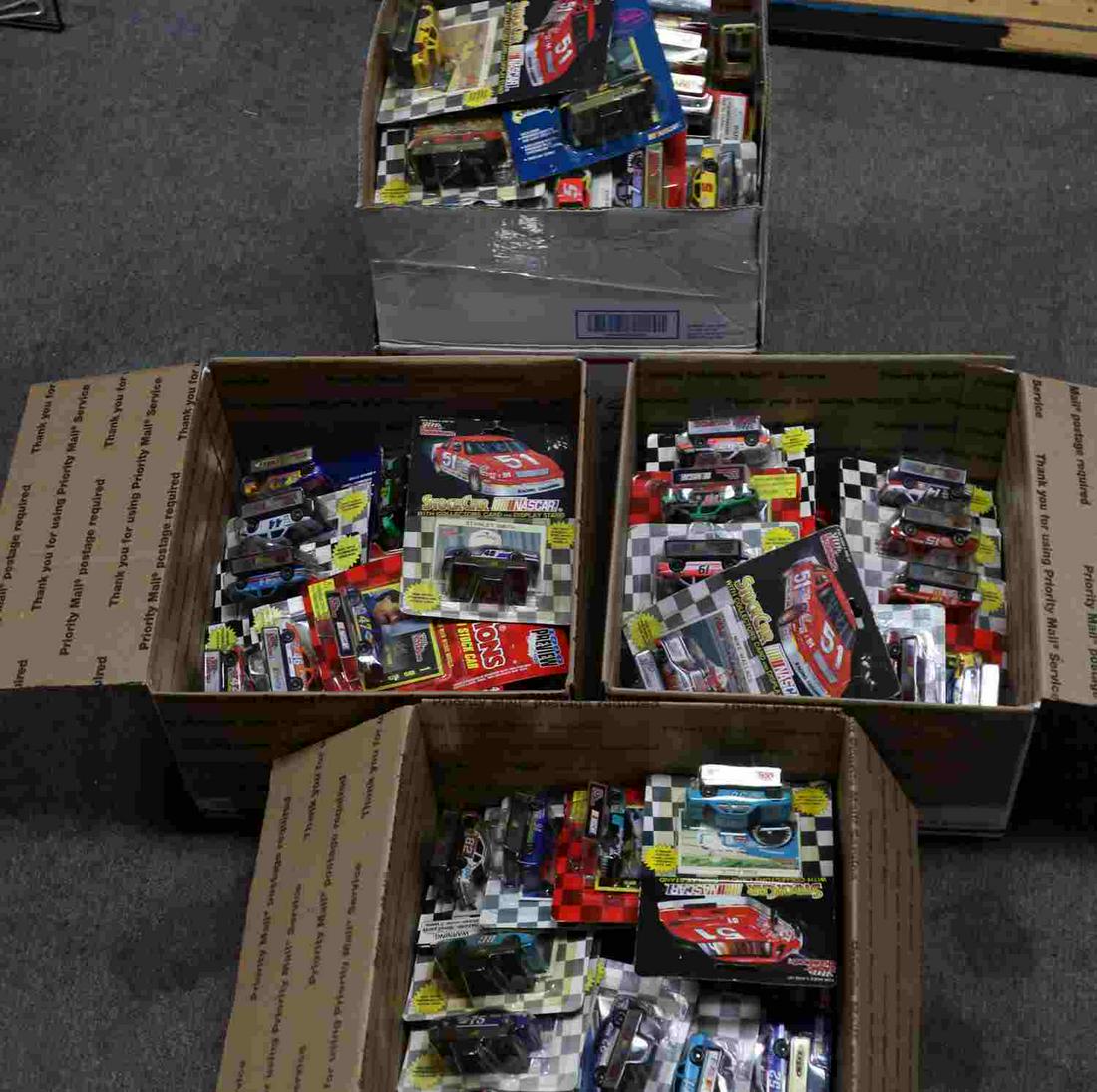 OVER 100 ASSORTED NASCAR TOY CAR MODELS DEALER LOT: Dealer's lot of over 100 assorted Nascar models. Good variety in age, brands, types, and sizes. Most are 1:43 and 1:64 size. All are unopened and in original packaging. Some packaging wear present.
