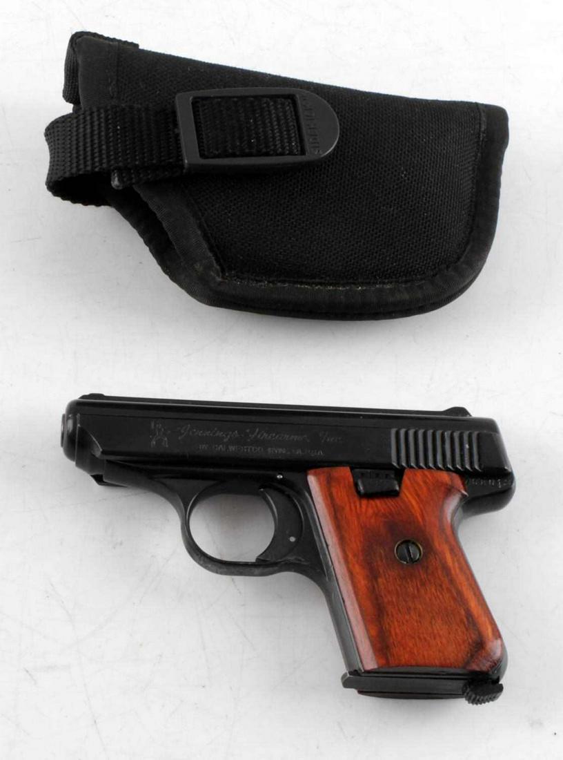 JENNINGS FIREARMS MODEL J-22 PISTOL: Jennings Firearms, Inc. Model J-22 .22 long cal. semi automatic pistol. Black finish with a 2.5 inch barrel. Includes 1 6-round magazine and wood grain grips. In good condition. Includes Sidekick clot