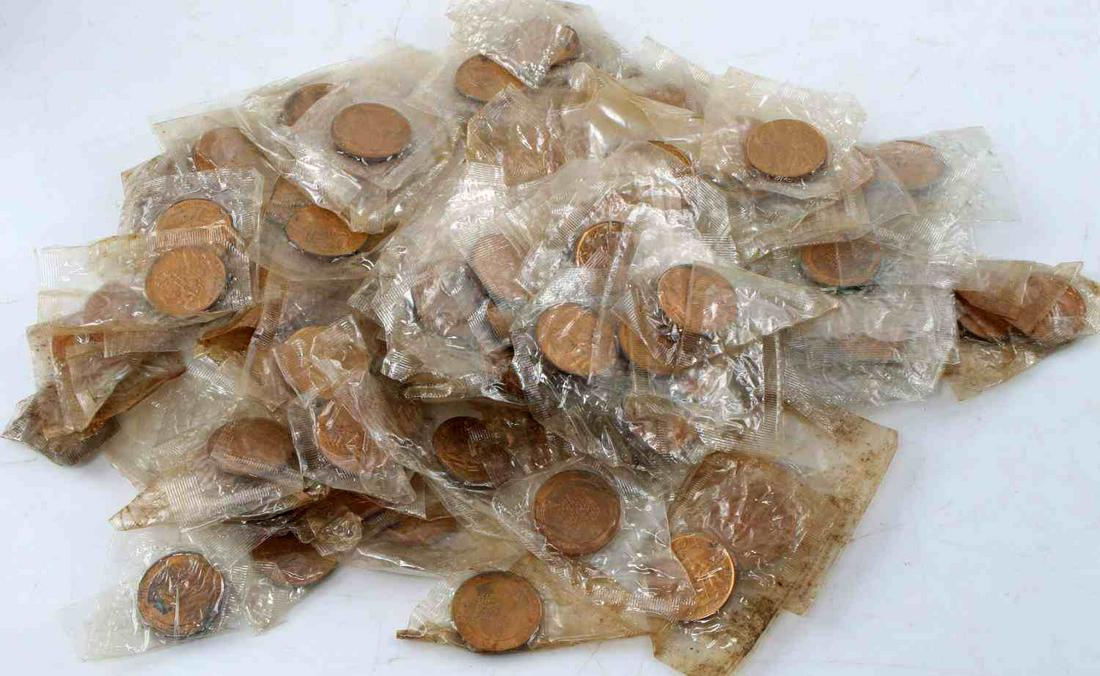 APOLLO 11 COMMEMORATIVE COIN TOKEN LOT OF 200: 200 Apollo 11 commemorative tokens dating from 1969, all new in sealed baggies. Each token measures 1 inch in diameter. Obverse reads "APOLLO XI" across the top and "ARMSTRONG-ALDRIN-COLLINS" with an 