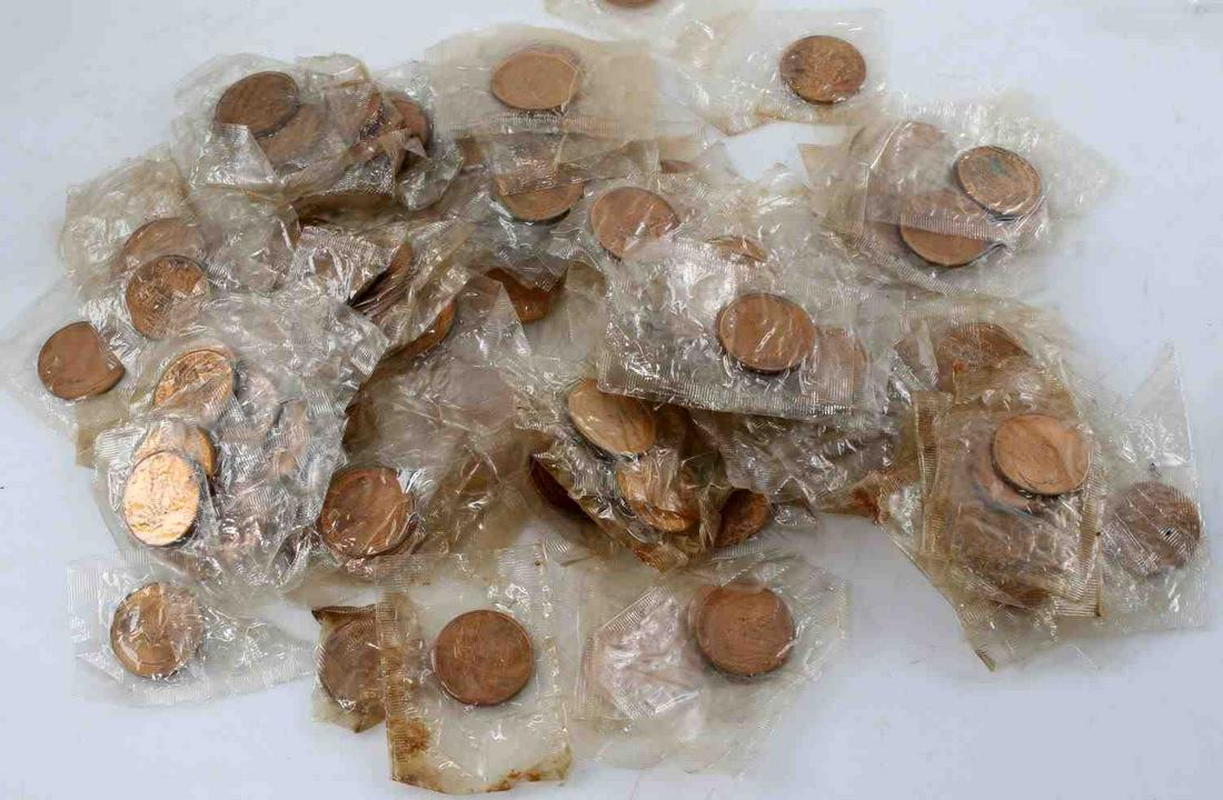 APOLLO 11 COMMEMORATIVE COIN TOKEN LOT OF 200: 200 Apollo 11 commemorative tokens dating from 1969, all new in sealed baggies. Each token measures 1 inch in diameter. Obverse reads "APOLLO XI" across the top and "ARMSTRONG-ALDRIN-COLLINS" with an 