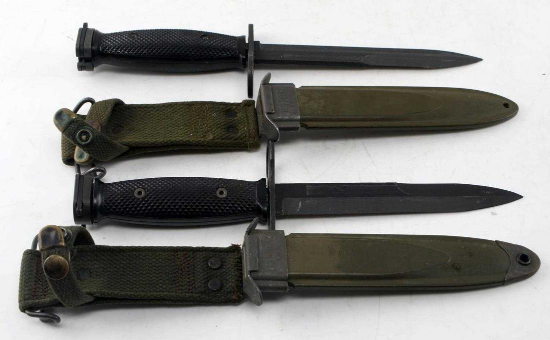 LOT OF 2 US MILITARY M7 KNIFE BAYONETS W SCABBARDS: Blades measure 6 7/8 inches long, black rubber grips, and M8A1 scabbard for each. Very good condition.