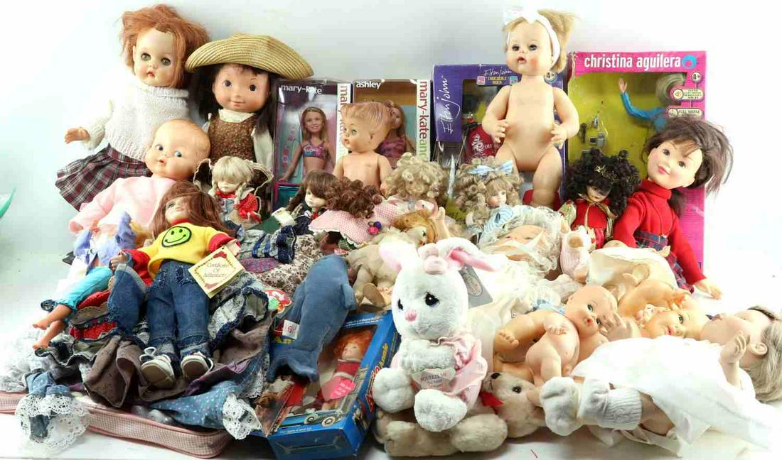 LARGE LOT OF ASSORTED DOLLS GOTZ CHRIS MILLER: Large lot of assorted dolls. Includes Yaboom Elton John, Christina Aguilera, Mary Kate and Ashley. All 4 still in box. Also includes 6 Chris Miller Originals International dolls with stands for each.