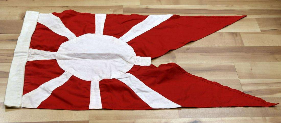 WWII JAPANESE NAVY SENIOR OFFICER ON BOARD PENNANT: Used to denote which ship in the flotilla the ranking officer was on. Double sided and measures 34 by 22 inches. Faded but present Japanese writing on corner of halyard. Good condition. Unauthenticate