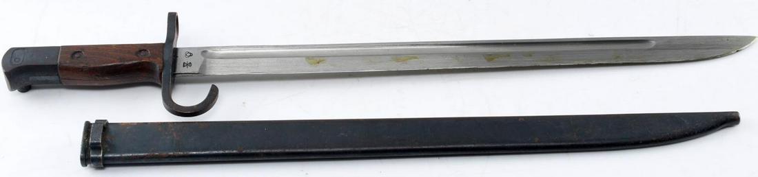 WWII JAPANESE IMPERIAL ARISAKA TYPE 30 BAYONET: An Arisaka type 30 sword bayonet with original scabbard. Its ricasso bears the arsenal mark of an unknown company under the supervision of Kokura. The blade is bright with original cross grain and in