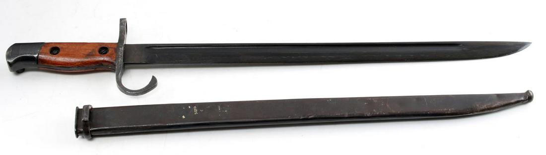 WWII IMPERIAL JAPANESE ARISAKA BAYONET TOKYO: Japanese Arisaka bayonet. Marked with Tokyo Hohei Kosho arsenal mark on its ricasso. Hooked quillion version with correct steel scabbard. In very good condition overall. Some abrasions, wear, and a fe