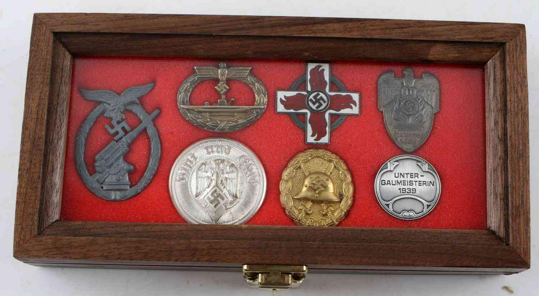 WWII GERMAN CASED BADGE & BUCKLE LOT OF 7: Includes: Luftwaffe Flak Artillery Badge; Naval Kriegsmarine U- Boat Submarine Badge; Hitler Youth HJ Leaders Belt Buckle; Fire Brigade Decoration; Gold Spanish Condor Legion Wound Badge. 1936 Franken