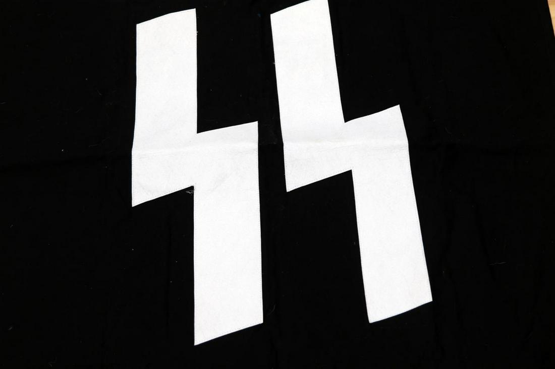 REENACTORS WWII GERMAN SS BANNER FLAG: Reenactor's SS flag. Measures approximately 39 x 29.5 inches. In good condition with some light staining and wear present.