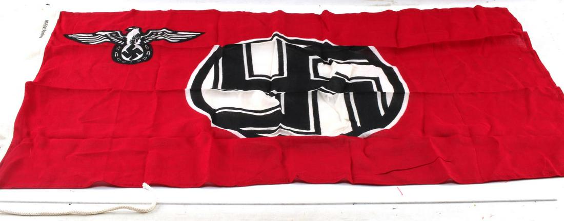 WWII GERMAN GOVERNMENT STATE SERVICE BANNER FLAG: Measures 36” wide by 21 1/2” tall. The white reinforced cotton bunting with rope on one end is maker marked "Franze Eberhardt fahnerfabrik West." It is also marked "Reichsbflg 55 x 90." Multi piec