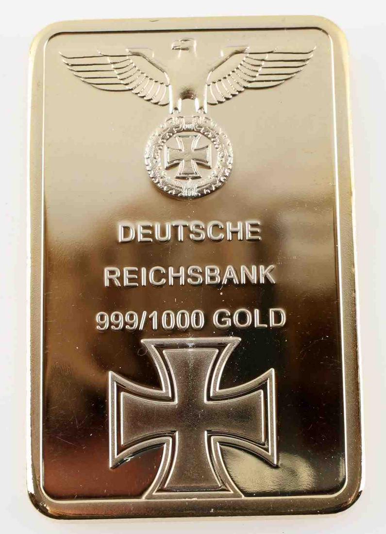 POST WWII FACSIMILE GERMAN REICHBANK GOLD BAR: Facsimile gold bar from post-WWII German Reichsbank. Measures 1 1/16 inches wide by 1 3/4 inches tall. One side reads "Deutsche Reichsbank 999/1000 Gold.' Has a German eagle and Iron Cross. Reverse re
