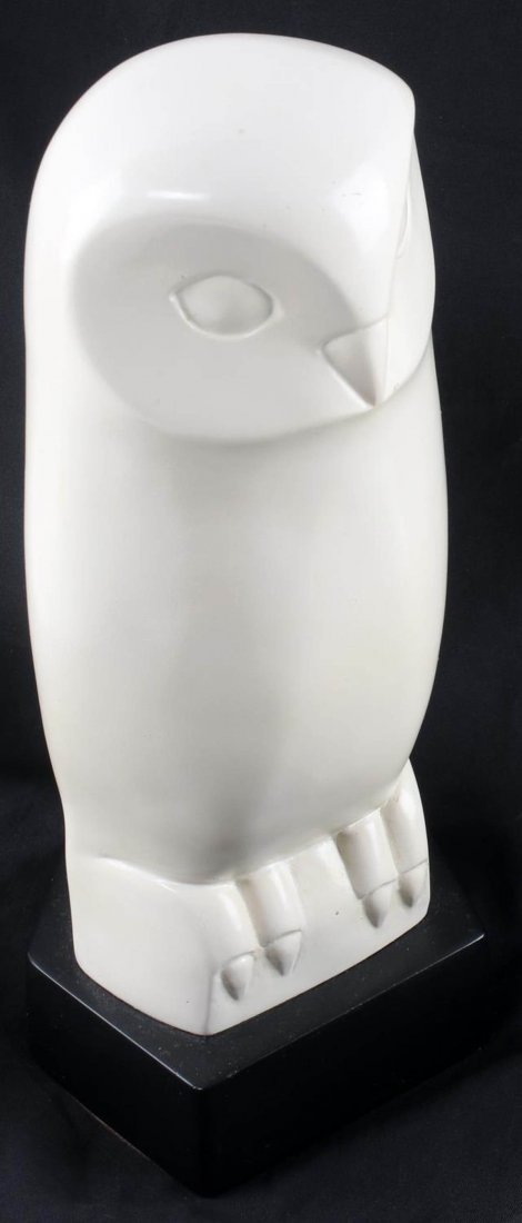 CLEO HARTWIG PLASTER OWL SCULPTURE ON BASE: Cleo Hartwig (American, 1911-1988) white owl sculpture on black base. Signed to back of owl. Measures 10.5 inches tall. Very good condition.
