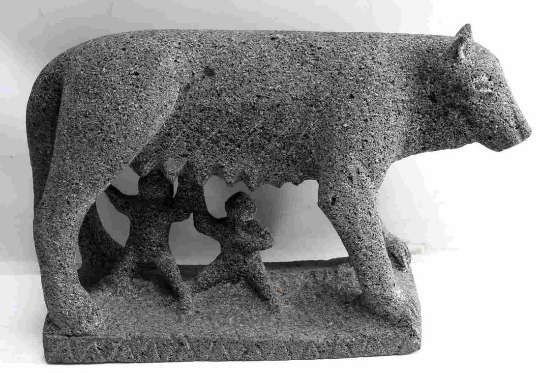 BASALT STATUE OF ROMULUS & REMUS W NURSING WOLF: Statue is of indeterminate age but has patination and appears to be very old. In very good condition with weathering. Measures 13.5 inches by 6 inches by 11.5 inches. Weighs 37.4 pounds. This lot has 
