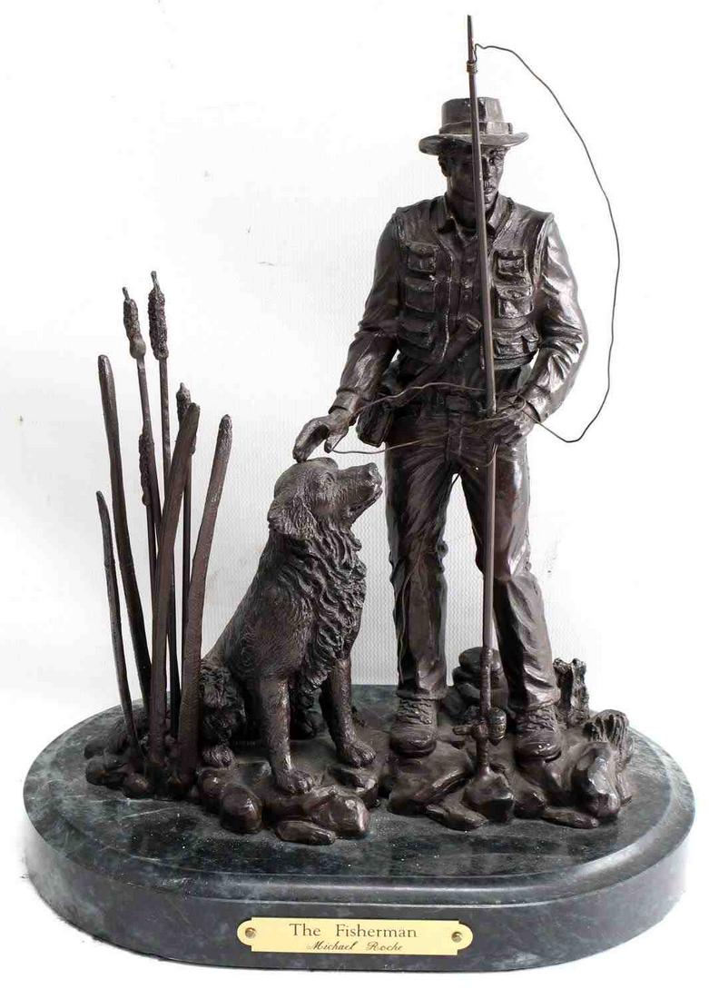 MICHAEL ROCHE BRONZE FISHERMAN W DOG: Figure by artist Michael Roche in bronze. Shows a fisherman with his dog. Attached to marble base. In very good condition. Measures 9 inches by 6 inches by 12 inches.