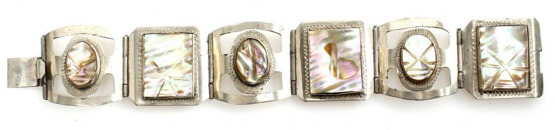 TAXCO .925 STERLING SILVER W ABALONE BRACELET: Six paneled Abalone shell and Sterling silver bracelet measures 7". Wt 39.5 grams