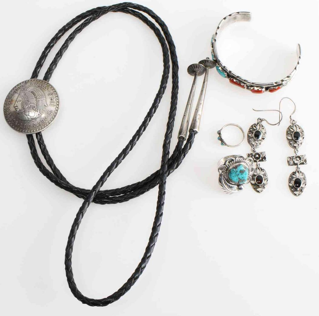 SOUTHWESTERN AND NATIVE STERLING SILVER JEWELRY: 1948 silver peso bolo with silver tips. Old Pawn style turquoise ring size 51/2. Pinpoint turquoise ring size 3 3/4. total weight 85 g.