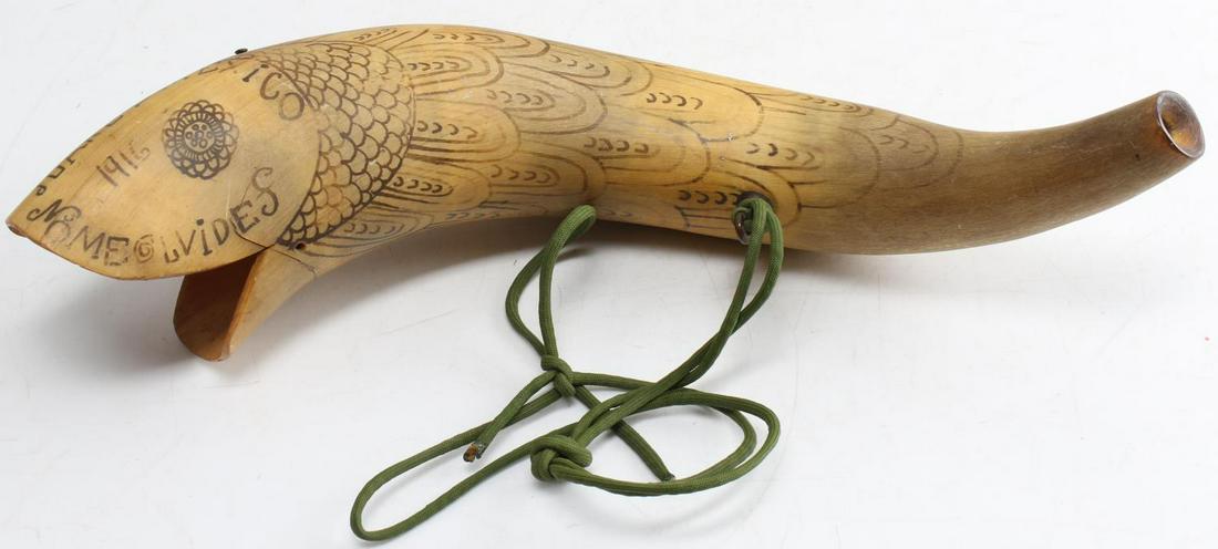 1916 MEXICAN EXPEDITION ANTIQUE BULL HORN ART: Bull horn with fish motif reads 1916 Juarez Mexico No Me Olvides. Measurements: 18" on the curve with 3 1/2" opening. Some loss and fade to image. Brass eyelet missing near mouth of image. 2" crack to