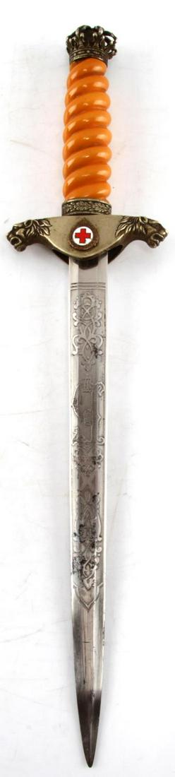 WWII BULGARIAN ARMY MEDICAL OFFICER DRESS DAGGER: Very nice etched blade, Bakelite grip, pebble scabbard with light surface rust, nicely detailed dagger. This lot has a reserve.
