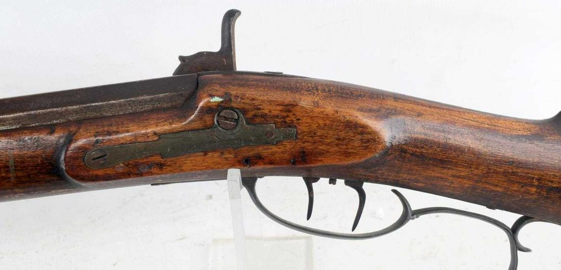 ANTIQUE PERCUSSION RIFLE OCTAGON BARREL .41 .43CAL: Full wood stock with wooden patch box and wooden tacks throughout, iron furniture with quail scene engraved to lock plate, octagon barrel measures 40.5 inches long with fair bore, bore measures 11mm i