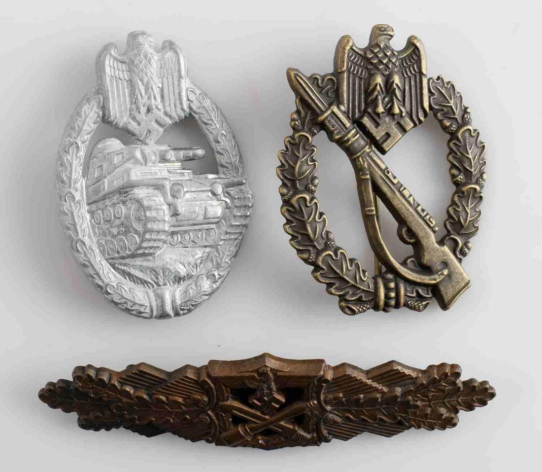 WWII THIRD REICH GERMAN BADGE LOT ASSAULT COMBAT: Lot includes: Close combat clasp in bronze, Panzer Assault badge, and Infantry Assault badge. Good condition. Unauthenticated, sold as is.