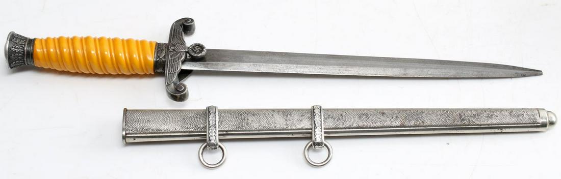 WWII GERMAN THIRD REICH HEER ARMY DAGGER: German heer dagger by Krebs. In good condition with great bakelite handle and silver-toned pebbled scabbard. Tip of blade is broken. Very good with this exception.