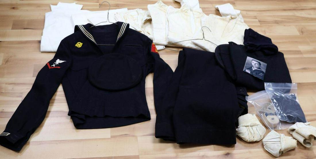 WWII AMPHIBIOUS ASSAULT USN UNIFORM & OTHERS: Gunners mate 3rd class, with amphibious assault patch,Ruptured Duck, trousers, blouse and early war cap, small size, neckerchiefs stamped "W.P. Davis," swimming trunks, sweater, caps, three white trou