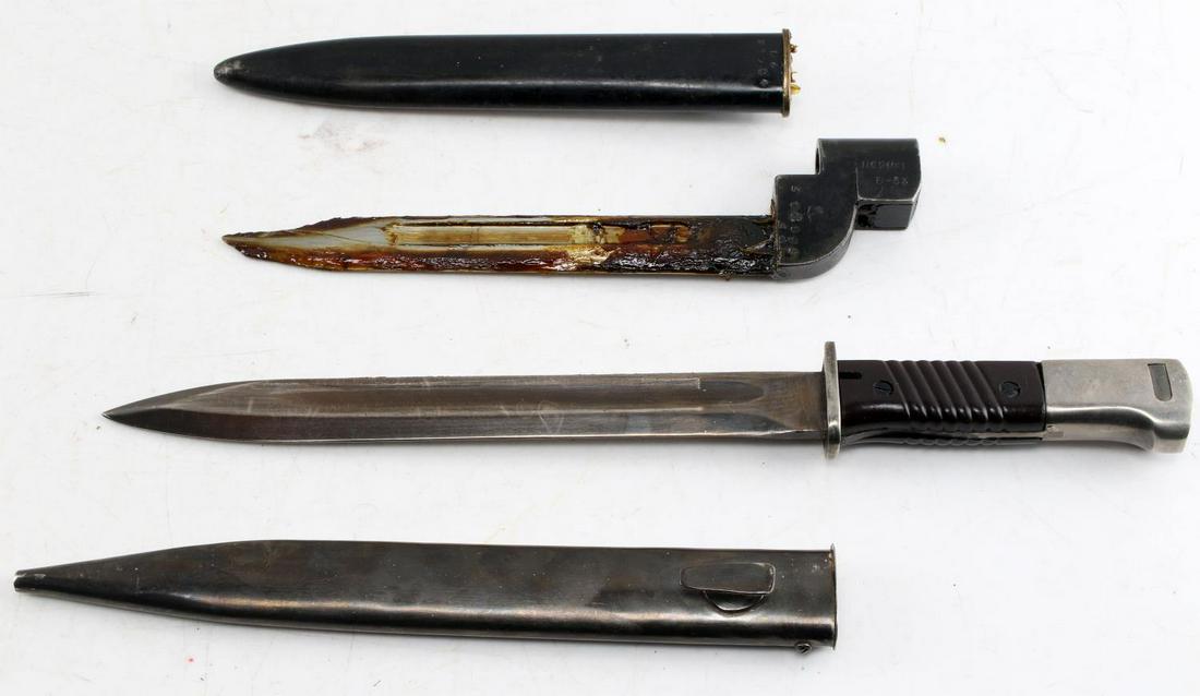 NEAR MINT GERMAN K-98 AND BRITISH MARK I BAYONETS: The K-98 bayonet has no markings or numbers, Bakelite grip appears unissued the British is still in grease, with matching serial number and broad arrow marked._