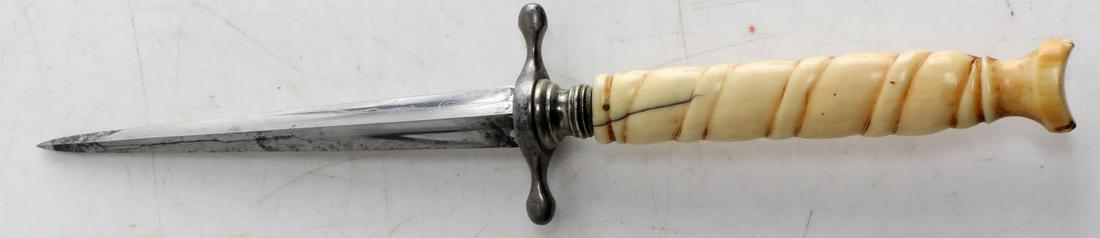 ANTIQUE GAMBLERS DIRK SWIRL CARVED BONE GRIP: Antique gambler's dirk with diamond-shaped blade and a bone grip carved into a swirl-shape. In very good condition. Measures 7.5 inches long._