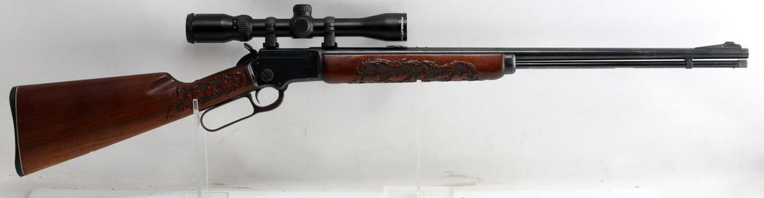 MARLIN MODEL 39 A .22 CALIBER LEVER ACTION RIFLE: Beautiful gun with leaf fall scene relief carved stock, serial number shows manufacturer date of 1953, the current owner purchased in 1969 and has been in his meticulous care ever since. A Pursuit Rim