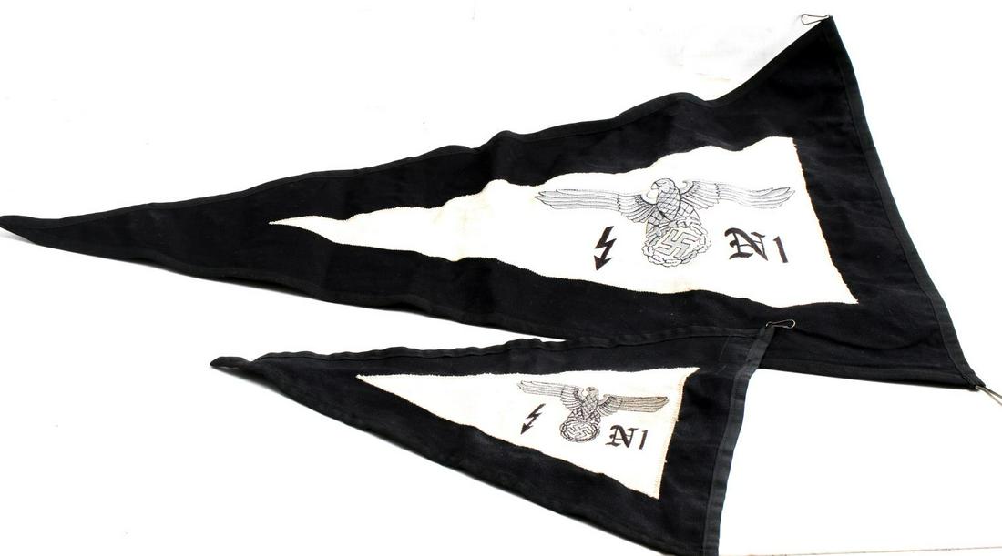 GERMAN WWII LOT OF 2 SS PENNANT COMMANDER FLAG: German WWII Lot of 2 double-sided SS pennants, one larger than the other. Both have tag that reads "vom reichsführer ss befohlene ausführung." Labeled SS and RZM. Pennant size 29 by 19 inches and 14