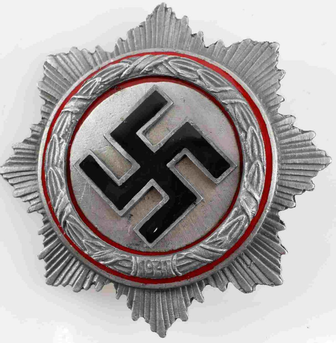 WWII 3RD REICH GERMAN CROSS MEDAL IN SILVER: Faithful reproduction of the German Cross decoration in silver edition. Has G. Brehmer maker mark on the back, in very good condition. Unauthenticated. Sold "as is".