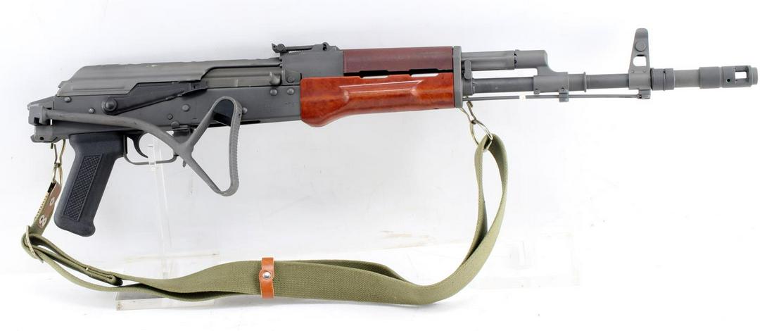 ARMORY USA SEMI AUTO RIFLE 5.45 X 39 FOLDING STOCK: Model AUSA, matte green gray steel, 19 inch barrel with muzzle break, bright clean bore, 11 in circle, 1991 ZH4397 marked to left side receiver, Interarms import mark to left side, Armory USA mark to 