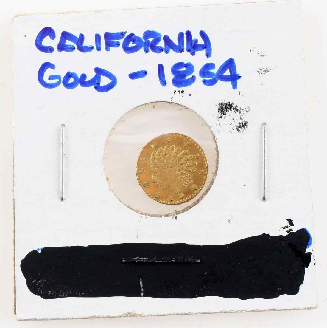 1854 CALIFORNIA FRACTIONAL GOLD COIN: California gold fractional coin. Round version. Dated 1854.