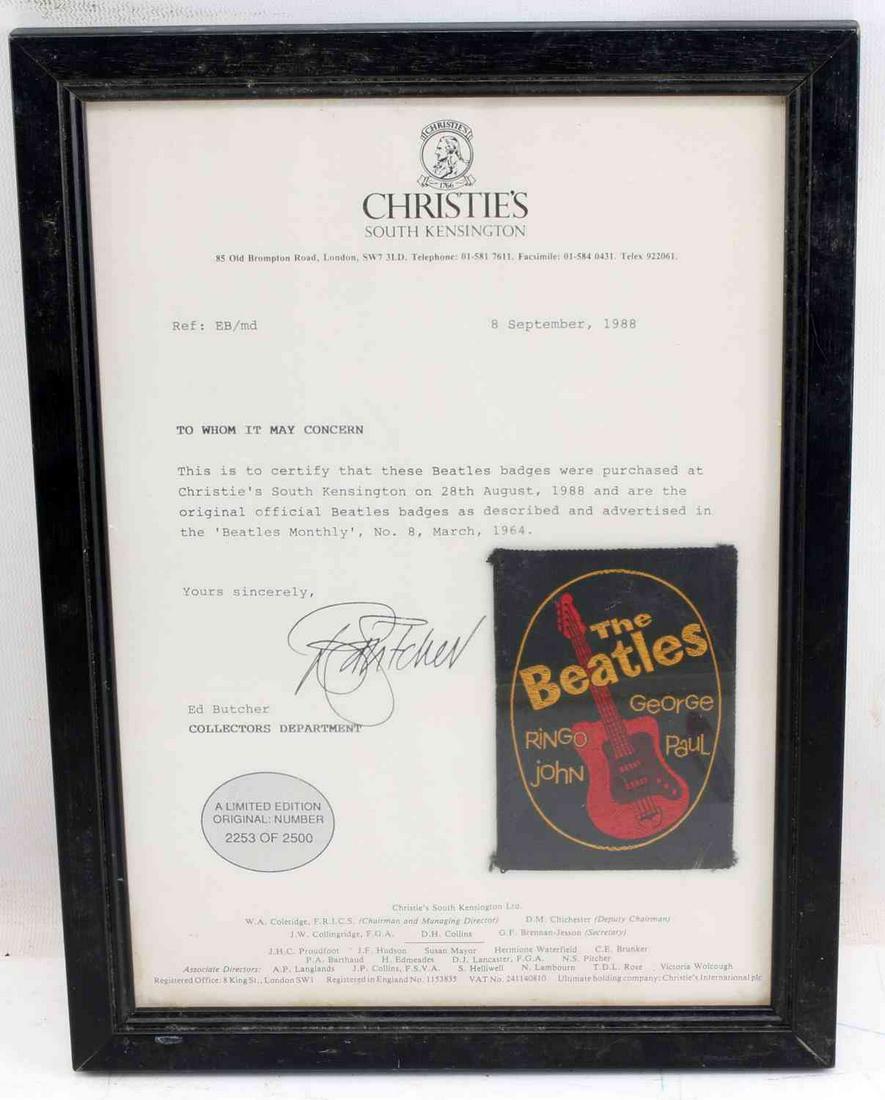 ORIGINAL 1964 BEATLES SEW ON BADGE FROM CHRISTIES: An original official Beatles sew on badge that was originally advertised in The Beatles Monthly magazine. The badge comes framed with a letter from Christies, South Kensington which reads as follows: 