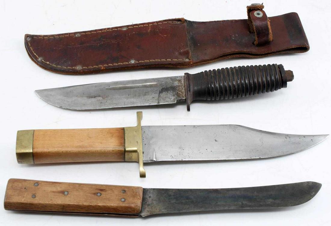 LOT OF 3 KNIVES WILSON CASE XX CLIP POINT KNIFE: The first is a Wilson skinning knife with a 6.5 inch blade, maker marked, wood grip. The second is an unmarked clip-point knife with a 7.25 inch blade and brass fittings. The third is a Case XX with a