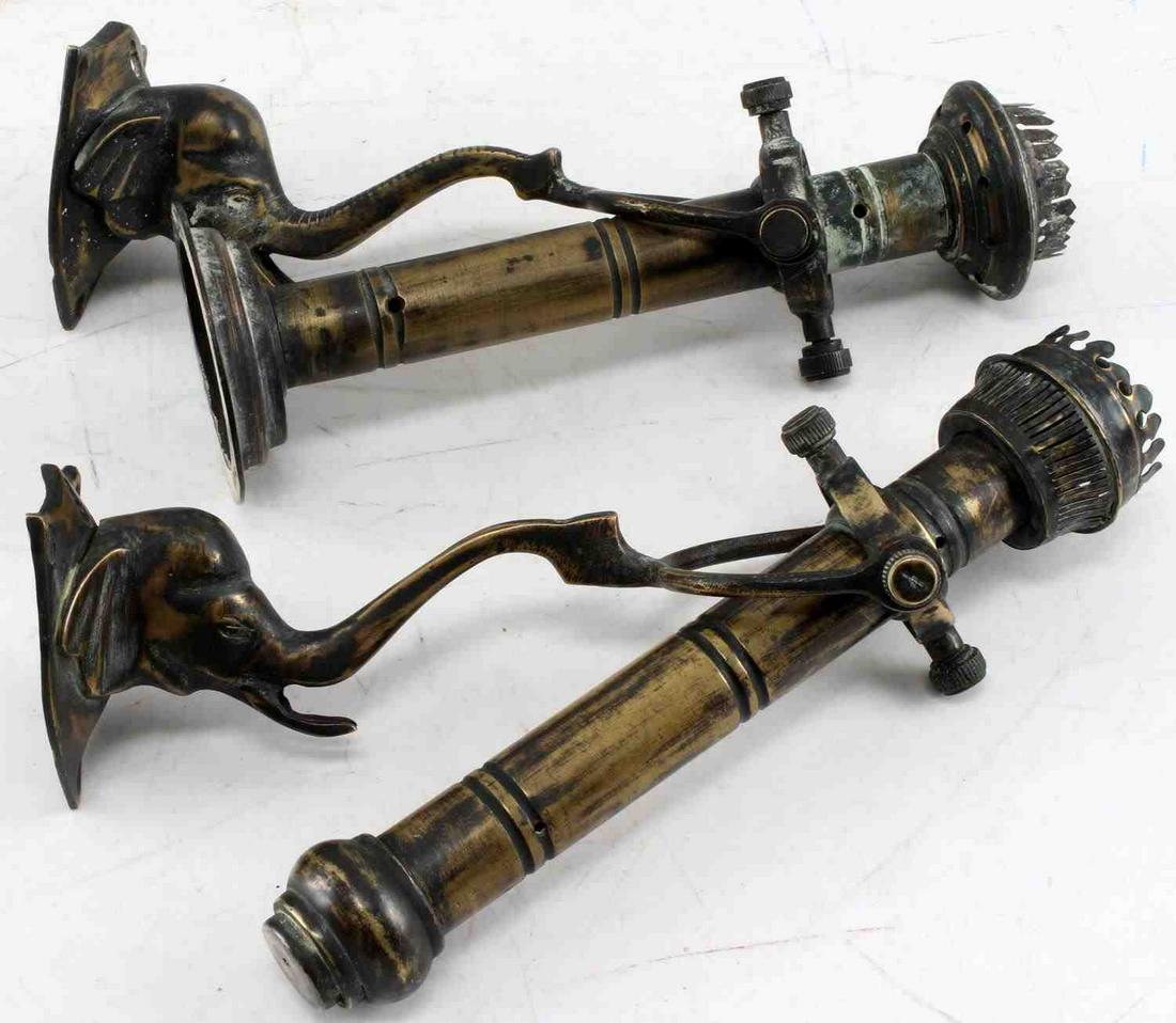 MID 19TH CENTURY ELEPHANT ADJUSTABLE LANTERN LOT: Mid 19th Century Elephant Lantern with adjustable brace lot of two. Elephant brace measures 8 inches. The length of the lantern is 10 inches. Makers mark of a four point crown on the bottom. Copper ha