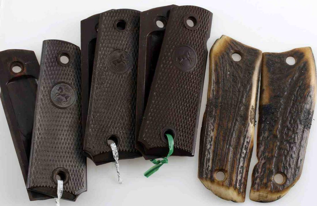 COLT 1911 PLASTIC & ANTLER GRIP LOT OF FOUR: Lot contains four sets of Colt 1911 grips. Three are brown plastic with the Colt emblem, and one is made of antler. All in very good condition.