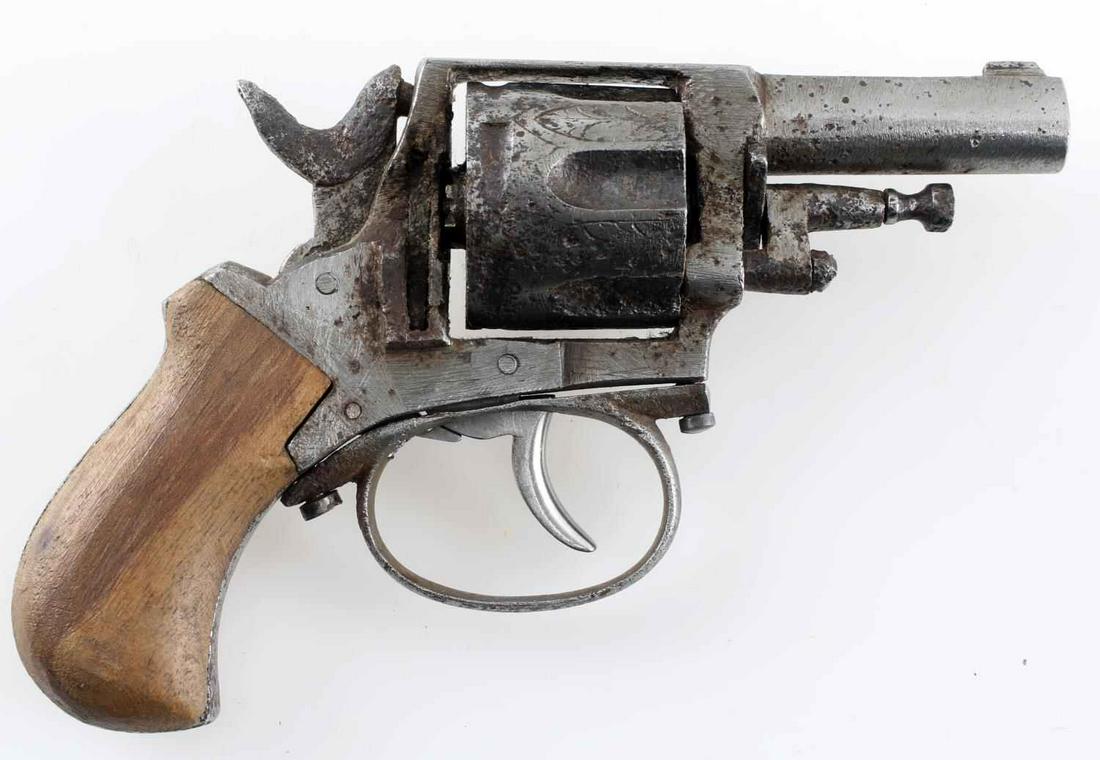BELGIAN BABY BULLDOG REVOLVER .32 CF: 1870's - 1880's manufacture. Heavy pitting, engraved cylinder, no visible markings, 2 inch barrel with fair bore, and wood grips. Double action works but is sticky. Cannot ship internationally. Calibe