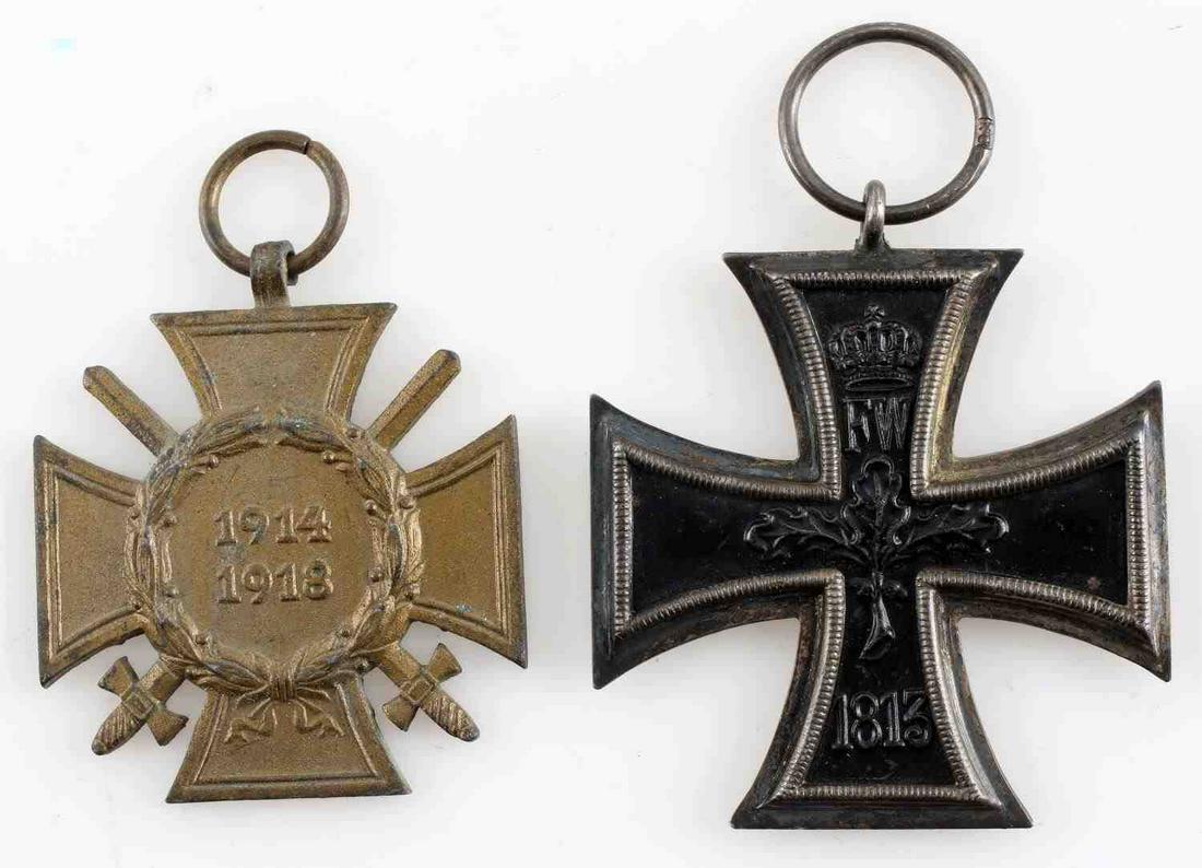 WWI IMPERIAL GERMAN IRON CROSS & HONOR CROSS MEDAL: German WWI second class Iron Cross and Honor Cross grouping. Iron cross has magnetic core and is marked with what appears to read "KO" on its suspension ring. In good condition with patina and wear pr