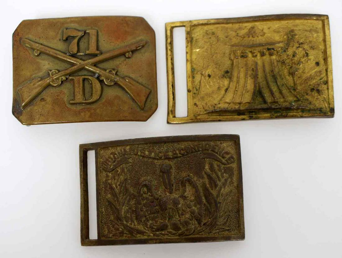 LOT OF 3 CIVIL WAR BRASS BELT BUCKLES: Lot of 3 belt buckles: one with crossed rifles and 71 D, one with tent scene, and one with Union Justice & Confidence title with pelican and grass. Good condition.