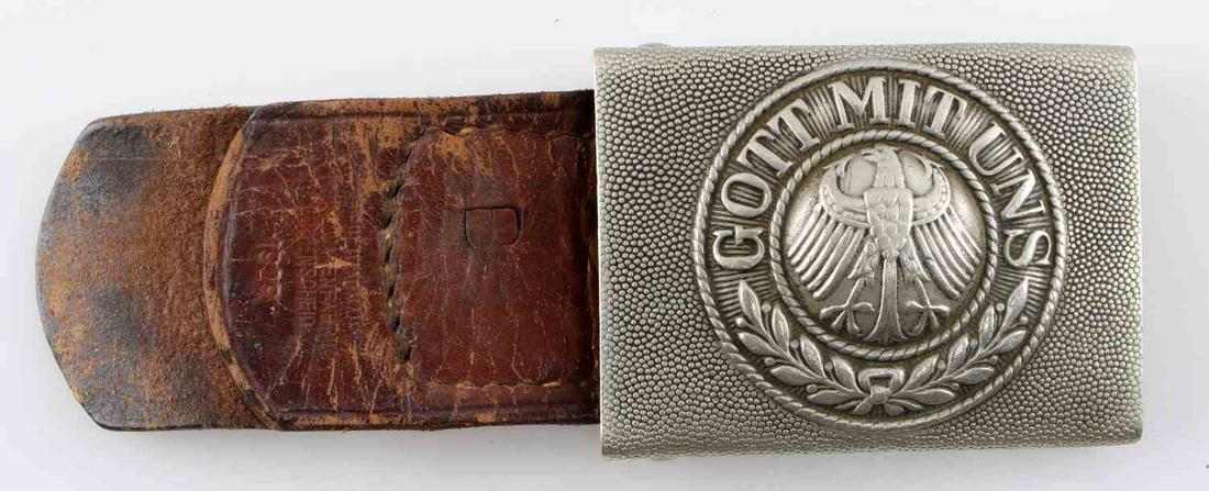 INTERWAR WEIMAR GERMAN ARMY EM BELT BUCKLE: Belt buckle for an enlisted man of the German Army in the Weimar period. Has 1929 date and Haarmann maker mark on the leather strap.
