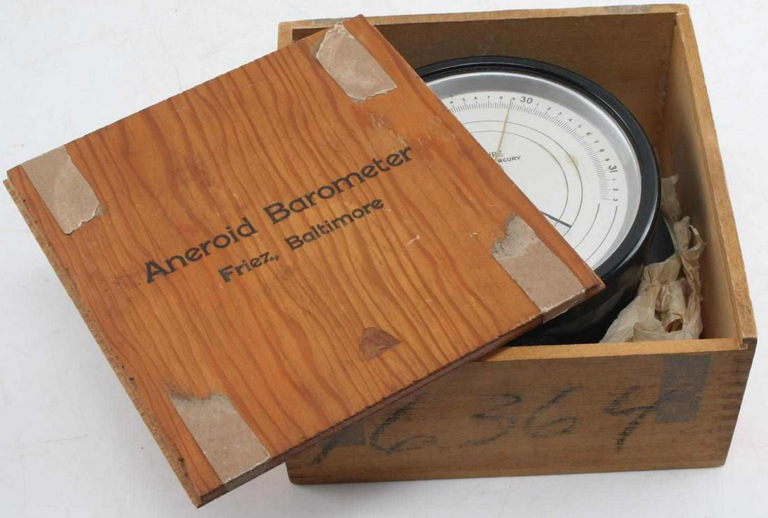 WWII US NAVY ANEROID BAROMETER FRIEZ BALTIMORE: WWII US Navy Aneroid barometer by Friez, Baltimore. In original case and in very good condition overall. Marked US Navy at top.