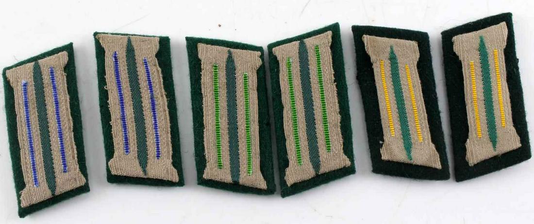 WWII GERMAN THIRD REICH COLLAR TAB LOT OF THREE: WWII German Third Reich collar tab lot of three. Lot includes three matching pairs of collar tabs. Signal officer tabs in good condition, Jager officer tabs have glue marks on the rear as well as the