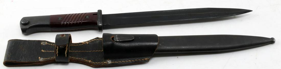WWII GERMAN THIRD REICH MAUSER K98 BAYONET: German Mauser bayonet. Marked "5288" over "d" and "ab44" on its ricasso. Also 2 Waffenamt marks on its pommel. In very good condition with matching number scabbard and leather frog. A good authentic e
