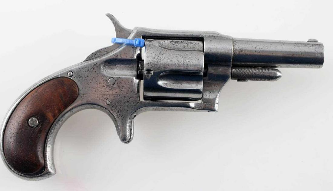 REMINGTON NO 4 RIMFIRE SPUR TRIGGER .41 REVOLVER: Remington No 4 Rimfire revolver. .41 with spur trigger and a 5 round cylinder. In fair condition with wear commensurate with age, cylinder does not lock up and hammer does not lock back for firing. An